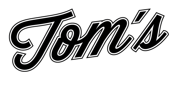 TOM'S TATTOO & PIERCING Logo